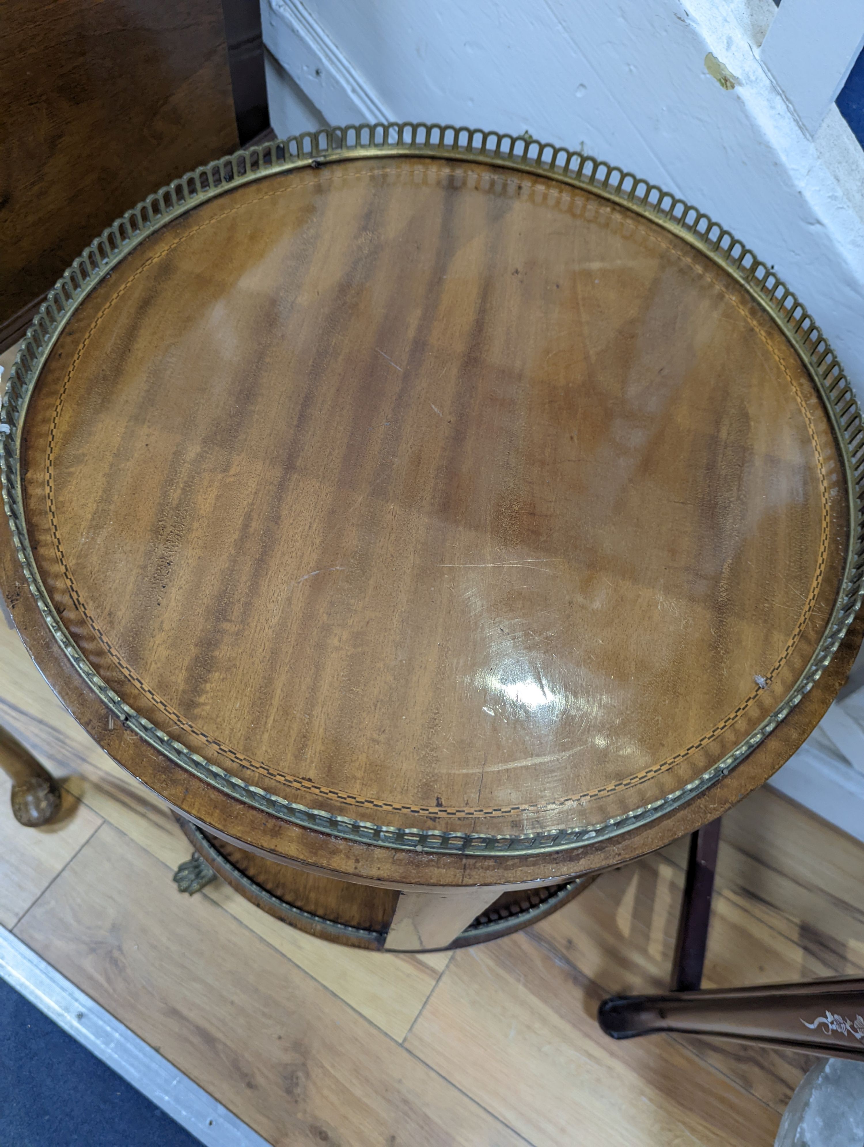 A Regency style circular mahogany revolving galleried bookcase, diameter 45cm, height 65cm